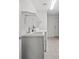 A laundry room with a utility sink and ample counter space for folding and sorting at 10809 Garden Mist Dr # 1004, Las Vegas, NV 89135