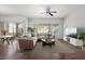 Bright and open living area with sliding glass doors to the exterior and a dining area at 10809 Garden Mist Dr # 1004, Las Vegas, NV 89135