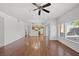 Bright living room with hardwood floors and a view to the kitchen at 10809 Garden Mist Dr # 1004, Las Vegas, NV 89135