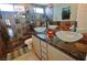 Modern bathroom with dual vessel sinks, tiled shower, and granite countertops at 1105 Enderly Ln, Las Vegas, NV 89144