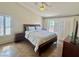 Cozy bedroom with shuttered windows, en suite bathroom, and comfortable furnishings at 1105 Enderly Ln, Las Vegas, NV 89144