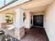 Welcoming front entrance with double doors, columns, and brick paver landing at 1105 Enderly Ln, Las Vegas, NV 89144