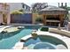 Inviting backyard pool and spa features a gazebo and ample space for entertaining at 1105 Enderly Ln, Las Vegas, NV 89144