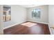 Bedroom features natural light, dark floors, and a modern aesthetic at 11079 Zampino St, Las Vegas, NV 89141
