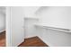 A simple closet with built-in shelving, providing practical storage solutions and organization at 11079 Zampino St, Las Vegas, NV 89141