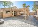 A covered patio with string lights overlooks the gray brick paver floor at 11079 Zampino St, Las Vegas, NV 89141