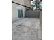 Small backyard with concrete patio and block wall at 1203 Mews Ln, Las Vegas, NV 89101