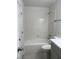 Clean bathroom features gray cabinets, white marble-look countertops and tile in the tub/shower at 1203 Mews Ln, Las Vegas, NV 89101