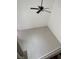 Angle view of bedroom featuring ceiling fan, wood floors, and white trim at 1203 Mews Ln, Las Vegas, NV 89101