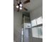 Bright, two-story entryway features a ceiling fan, staircase, and clerestory windows at 1203 Mews Ln, Las Vegas, NV 89101