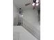 View of the second-story staircase with a landing, ceiling fan, and modern light fixtures at 1203 Mews Ln, Las Vegas, NV 89101