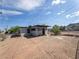 Backyard featuring an open space with fence, landscaping, and a single-story home at 170 Copper St, Henderson, NV 89015