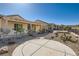 Backyard featuring decorative landscaping and covered awning at 2167 Shadow Canyon Dr, Henderson, NV 89044