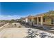 Backyard featuring decorative landscaping and covered awning at 2167 Shadow Canyon Dr, Henderson, NV 89044