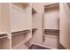 Walk-in closet with shelving and metal clothing racks at 2167 Shadow Canyon Dr, Henderson, NV 89044