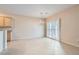Bright dining room with tile floors, chandelier, and sliding door leading to backyard at 2167 Shadow Canyon Dr, Henderson, NV 89044