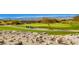 Picturesque golf course view with lush green fairways and scenic landscaping for an enjoyable golfing experience at 2167 Shadow Canyon Dr, Henderson, NV 89044