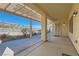 Back patio with decorative landscaping and covered awning at 2167 Shadow Canyon Dr, Henderson, NV 89044