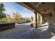 Covered patio includes outdoor kitchen, stunning pool and spa, and mountain views at 2215 Alcova Ridge Dr, Las Vegas, NV 89135