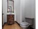 Elegant powder room features a stylish vanity with granite countertop and ornate mirror at 2215 Alcova Ridge Dr, Las Vegas, NV 89135