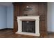 Detailed view of the fireplace featuring a stone mantel and built-in shelving on either side at 2215 Alcova Ridge Dr, Las Vegas, NV 89135