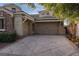 Spacious three-car garage with a wide driveway, providing ample parking and storage, adding convenience at 2215 Alcova Ridge Dr, Las Vegas, NV 89135