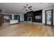 Open layout with modern kitchen, living room with fireplace, and ample natural light at 2215 Alcova Ridge Dr, Las Vegas, NV 89135