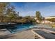 Sparkling swimming pool and spa with mountain views and lounge chairs for relaxing at 2215 Alcova Ridge Dr, Las Vegas, NV 89135