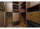 Stylish walk-in closet with custom shelving and a convenient closet rod at 2215 Alcova Ridge Dr, Las Vegas, NV 89135