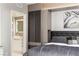 Comfortable bedroom featuring built-in storage, ensuite bathroom access, and modern decor at 222 Karen Ave # 3104, Las Vegas, NV 89109