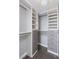 Spacious walk-in closet with white and gray shelving, drawers, and ample hanging space at 222 Karen Ave # 3104, Las Vegas, NV 89109