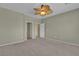 Bedroom features ceiling fan, doorway to another room, carpet, and neutral paint at 2256 Cordaville Dr, Henderson, NV 89044