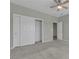 Bedroom features a ceiling fan, neutral carpet and large closet with sliding doors at 2256 Cordaville Dr, Henderson, NV 89044