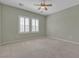 Spacious bedroom with plantation shutters and neutral carpet, offering a serene retreat at 2256 Cordaville Dr, Henderson, NV 89044