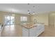 Open concept kitchen with a large center island and stainless steel appliances at 2256 Cordaville Dr, Henderson, NV 89044