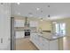 Modern kitchen with a large center island, stainless appliances, and pendant lighting at 2256 Cordaville Dr, Henderson, NV 89044