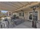 Covered patio with outdoor furniture and barbecue, perfect for relaxing and entertaining at 2256 Cordaville Dr, Henderson, NV 89044