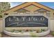 Latigo at Silverado Ranch community sign surrounded by beautiful flowers and bushes at 2300 E Silverado Ranch Blvd # 1123, Las Vegas, NV 89183