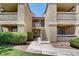 Inviting building featuring stairs, landscaping, and a well-maintained walkway at 2300 E Silverado Ranch Blvd # 1123, Las Vegas, NV 89183