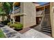 Exterior of building shows clean landscape, stairwell entrance and easy access to each level of living at 2300 E Silverado Ranch Blvd # 1123, Las Vegas, NV 89183