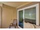 Comfortable patio seating and a sliding glass door leading inside at 2300 E Silverado Ranch Blvd # 1123, Las Vegas, NV 89183
