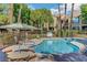 Beautiful community pool with patio furniture and meticulous landscaping offers resort-style living at 2300 E Silverado Ranch Blvd # 1123, Las Vegas, NV 89183
