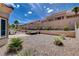 Backyard oasis features a stone patio, built-in hot tub and stainless steel grill at 2305 Hot Oak Ridge St, Las Vegas, NV 89134