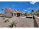 Enjoy your backyard featuring desert landscaping, built-in hot tub, and a covered patio at 2305 Hot Oak Ridge St, Las Vegas, NV 89134