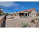 Low maintenance backyard with decorative rock, spa and covered patio at 2305 Hot Oak Ridge St, Las Vegas, NV 89134