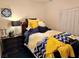 Bedroom featuring a plush bed with decorative pillows and closet with shutter doors at 2305 Hot Oak Ridge St, Las Vegas, NV 89134