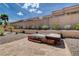 A built-in hot tub is the centerpiece of the beautiful backyard at 2305 Hot Oak Ridge St, Las Vegas, NV 89134