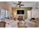 Comfortable living room featuring a ceiling fan, hardwood floors, and a serene atmosphere at 2305 Hot Oak Ridge St, Las Vegas, NV 89134