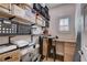 Organized office space with custom shelves and workspace desk at 2305 Hot Oak Ridge St, Las Vegas, NV 89134