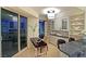Cozy dining area with city views, built-in shelving, and modern lighting at 2747 Paradise Rd # 1703, Las Vegas, NV 89109
